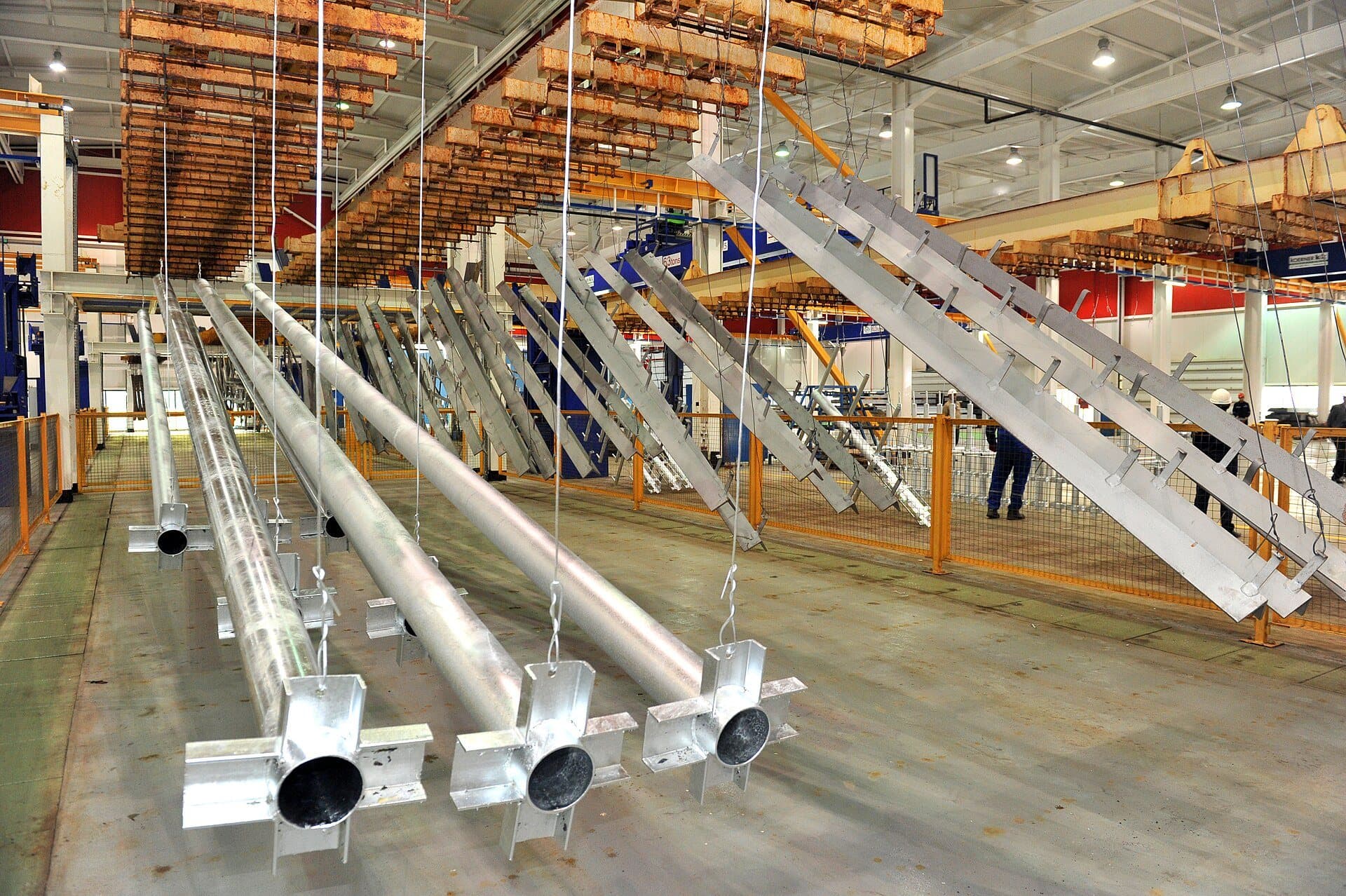 Steel parts hanging on a hot-dip galvanizing line